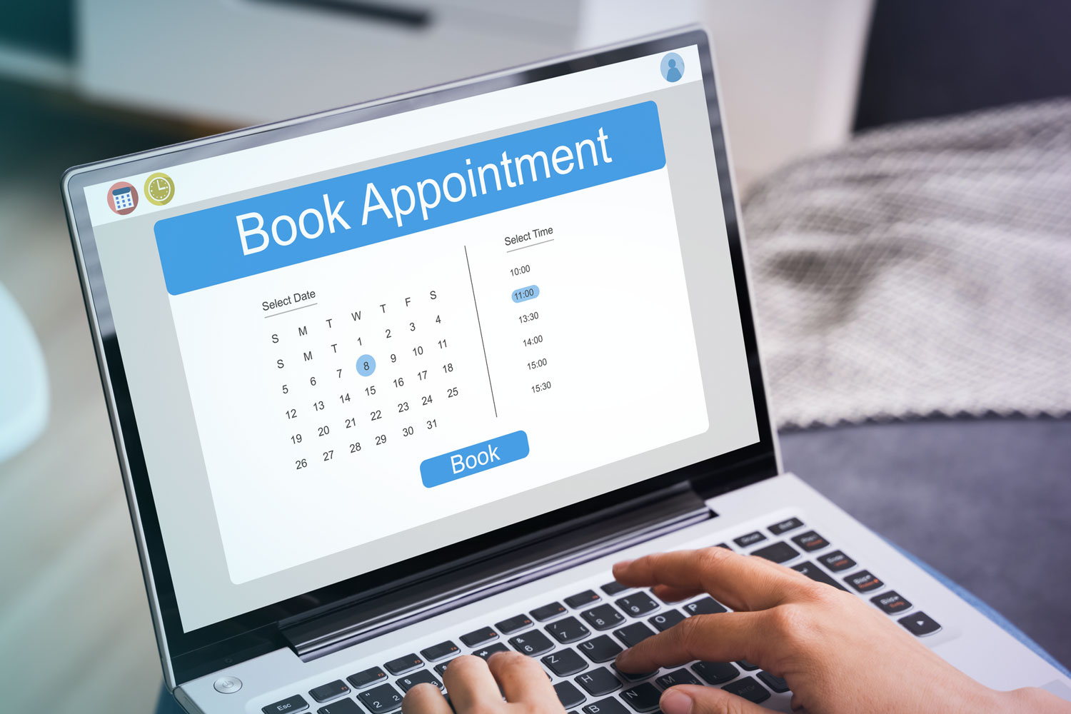 Computer screening showing a calendar to book an appointment